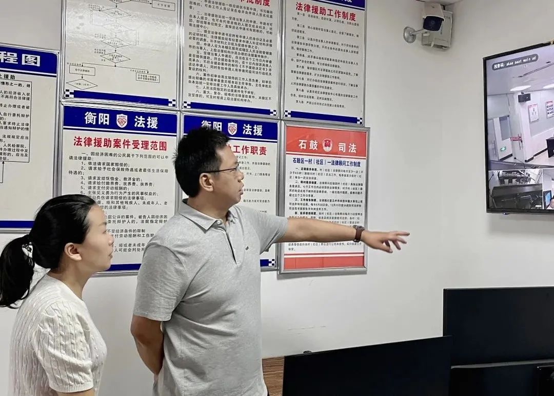 区委政法委调研人民街道综治中心“四实”建设工作